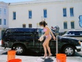Liz Cohen washing car.jpg